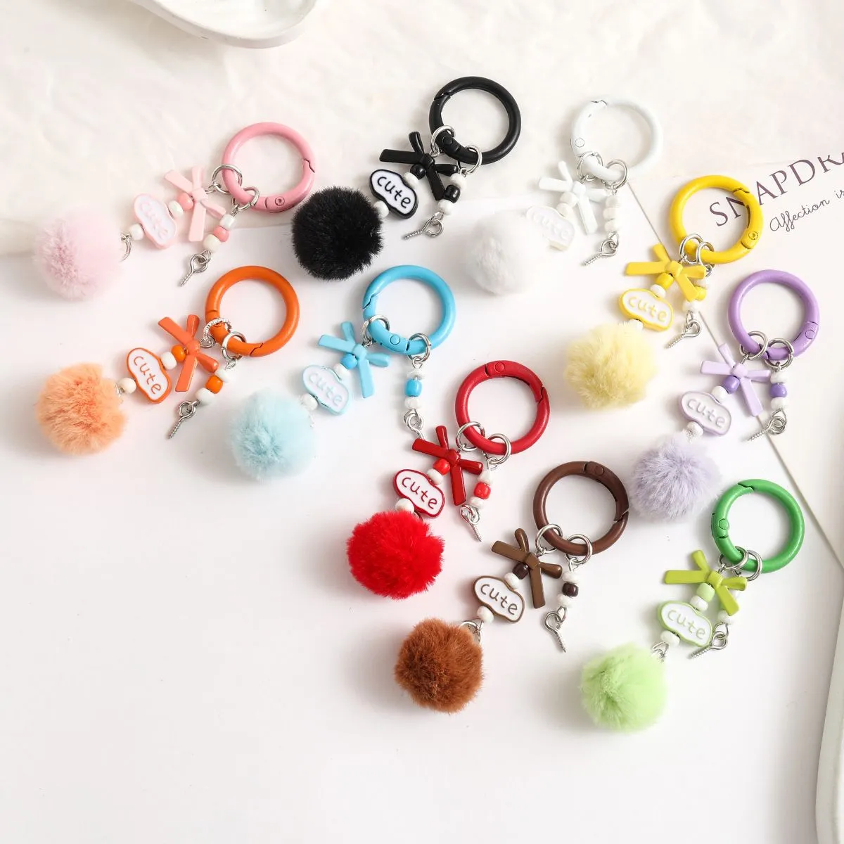 DIY Pom-Pom Alphabet Bow Blind Box Charm – Cute Keychain, Phone Chain & Bag Pendant, Trendy Accessory with Surprise Style